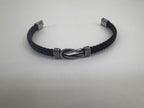 Pulsera de Acero y Cuero Nudo Entrelazado