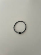 Pulsera de Piedra volcánica con detalles de Acero