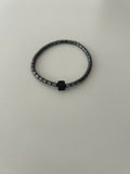 Pulsera de Piedra volcánica con detalles de Acero